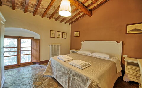 Alloggio Montegufoni 19b: Camera da letto