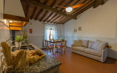 Alloggio Montelopio 7: Cucina, Sala da pranzo, Soggiorno