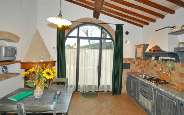 Alloggio Olivo: Cucina, Sala da pranzo, Soggiorno