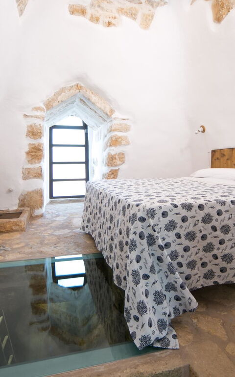 Trullo Torre Suda: Camera da letto