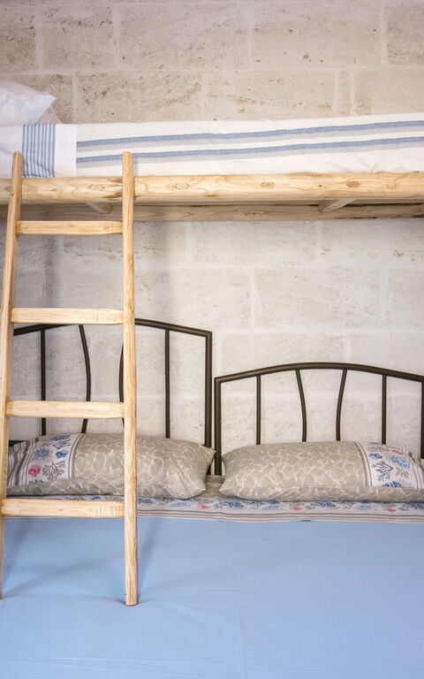 Trullo Torre Suda: Camera da letto