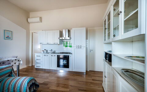 Alloggio Timone: Cucina, Sala da pranzo, Soggiorno