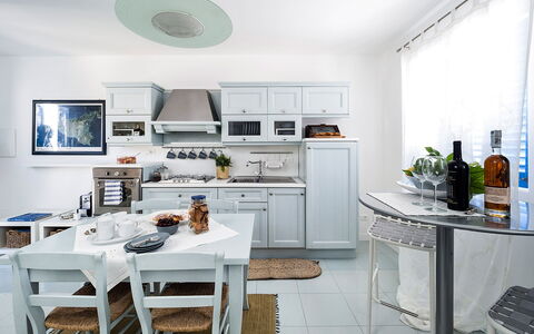 Alloggio Delfino: Cucina, Sala da pranzo, Soggiorno