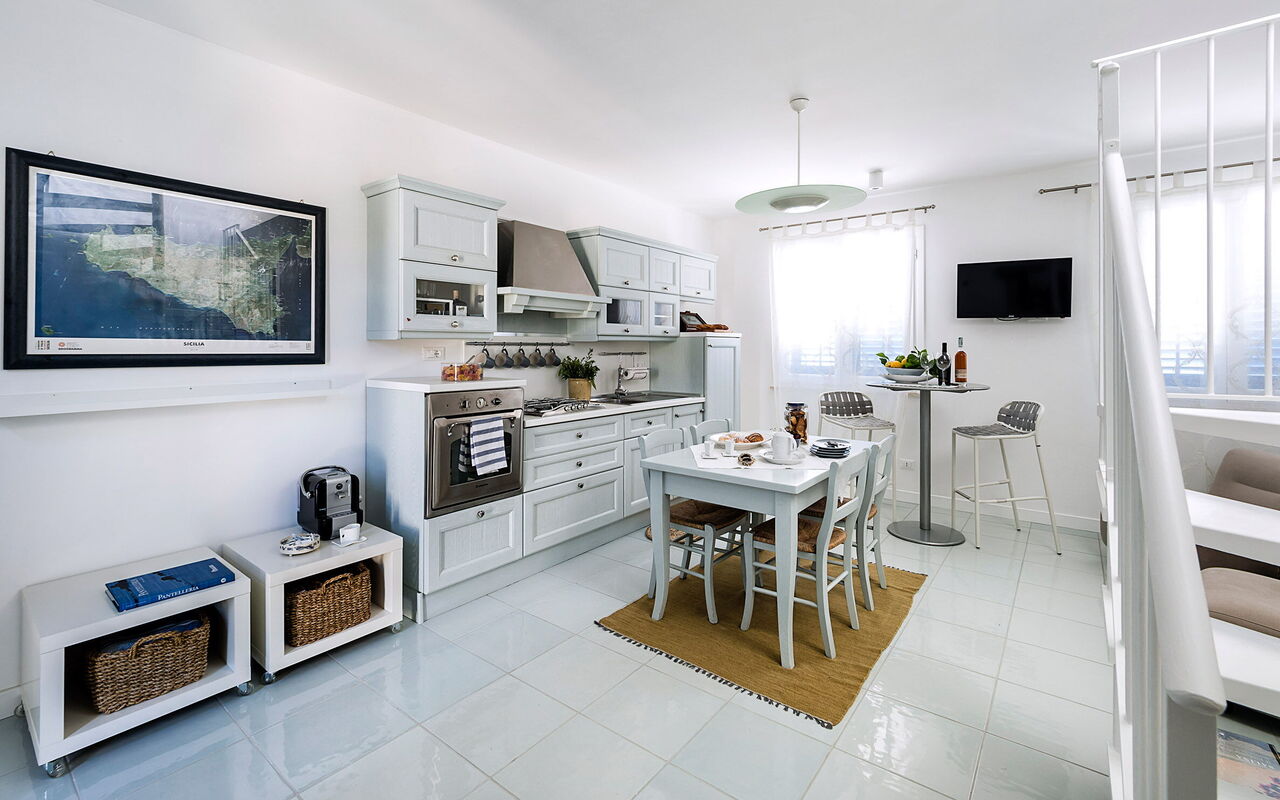 Alloggio Delfino: Cucina, Sala da pranzo, Soggiorno